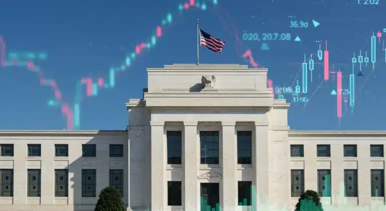 Federal Reserve building with financial charts, representing stable interest rates and inflation outlook.