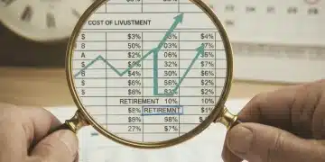 Magnifying glass examining financial documents related to 2026 COLA impact on retirement benefits